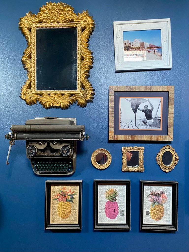 Along one of the walls in a corridor in the Hemingway Building is this small tribute to the writer consisting of typewriters attached to the wall and various photos of Hemingway and places and activities associated with him