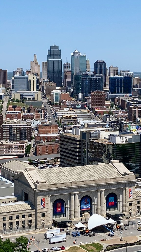 Photo showing a view of downtown Kansas City from the Liberty Memorial, with Union Station in the foreground